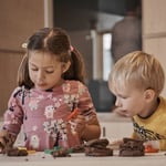 2 kids figuring out the activity in project-based learning