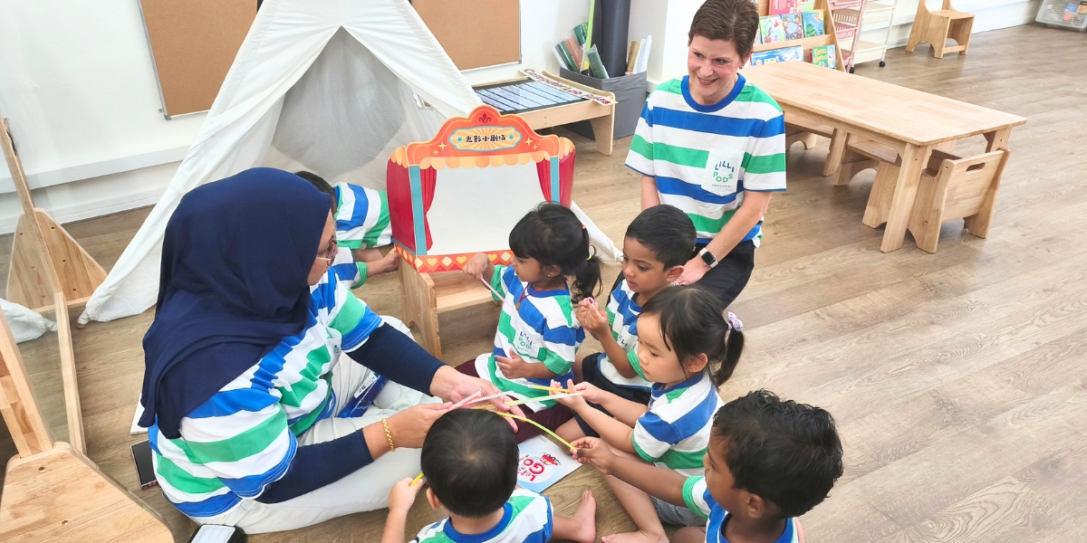 Lillipods Singapore children learning with teacher and Inkeri