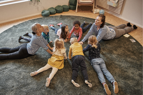 children and teachers stretching 600x400-1