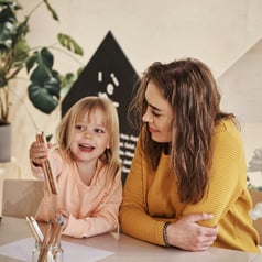 mom and daughter talking 500x500